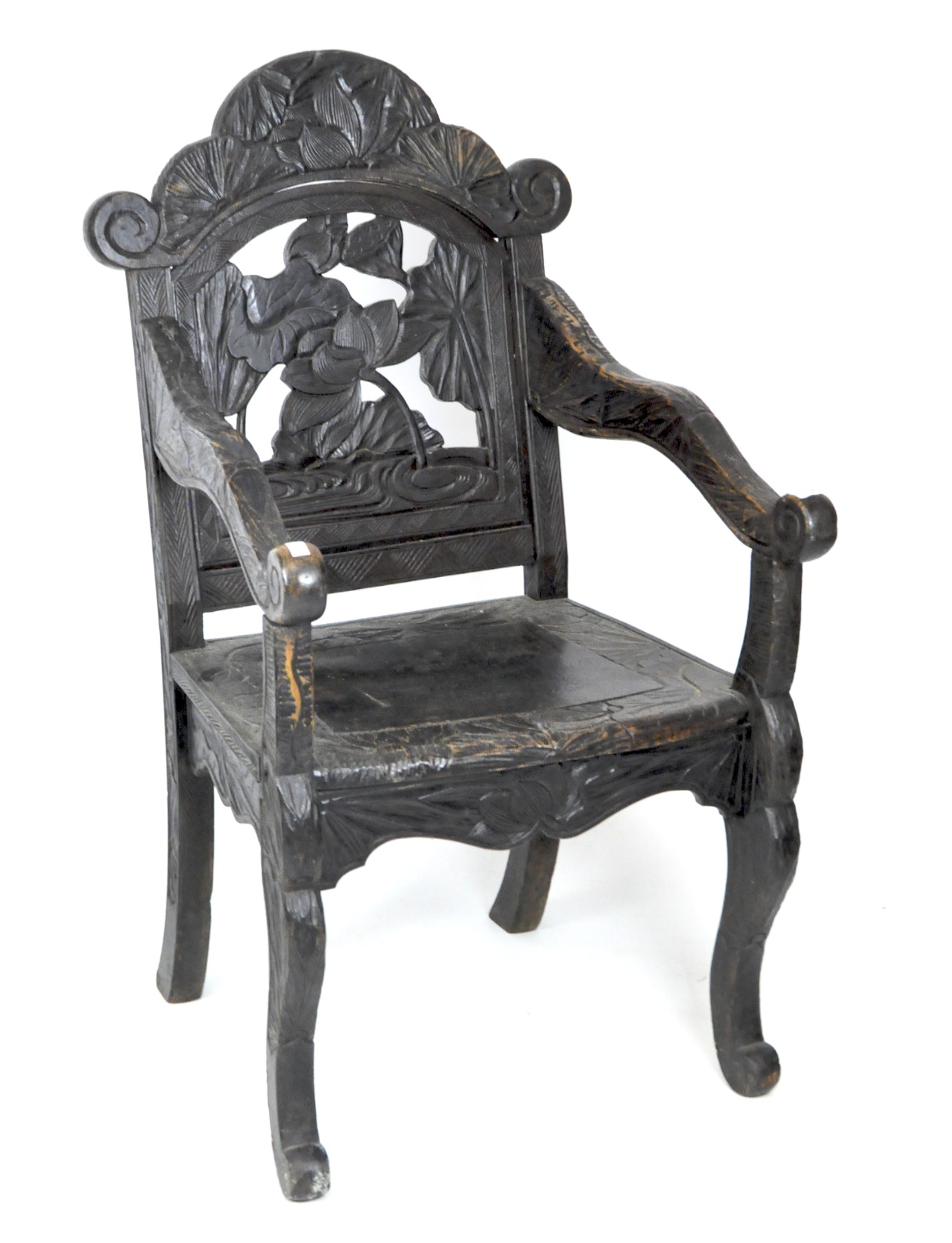 A 19th century carved wooden armchair,