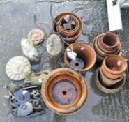 A selection of garden pots and other items of gardenalia,