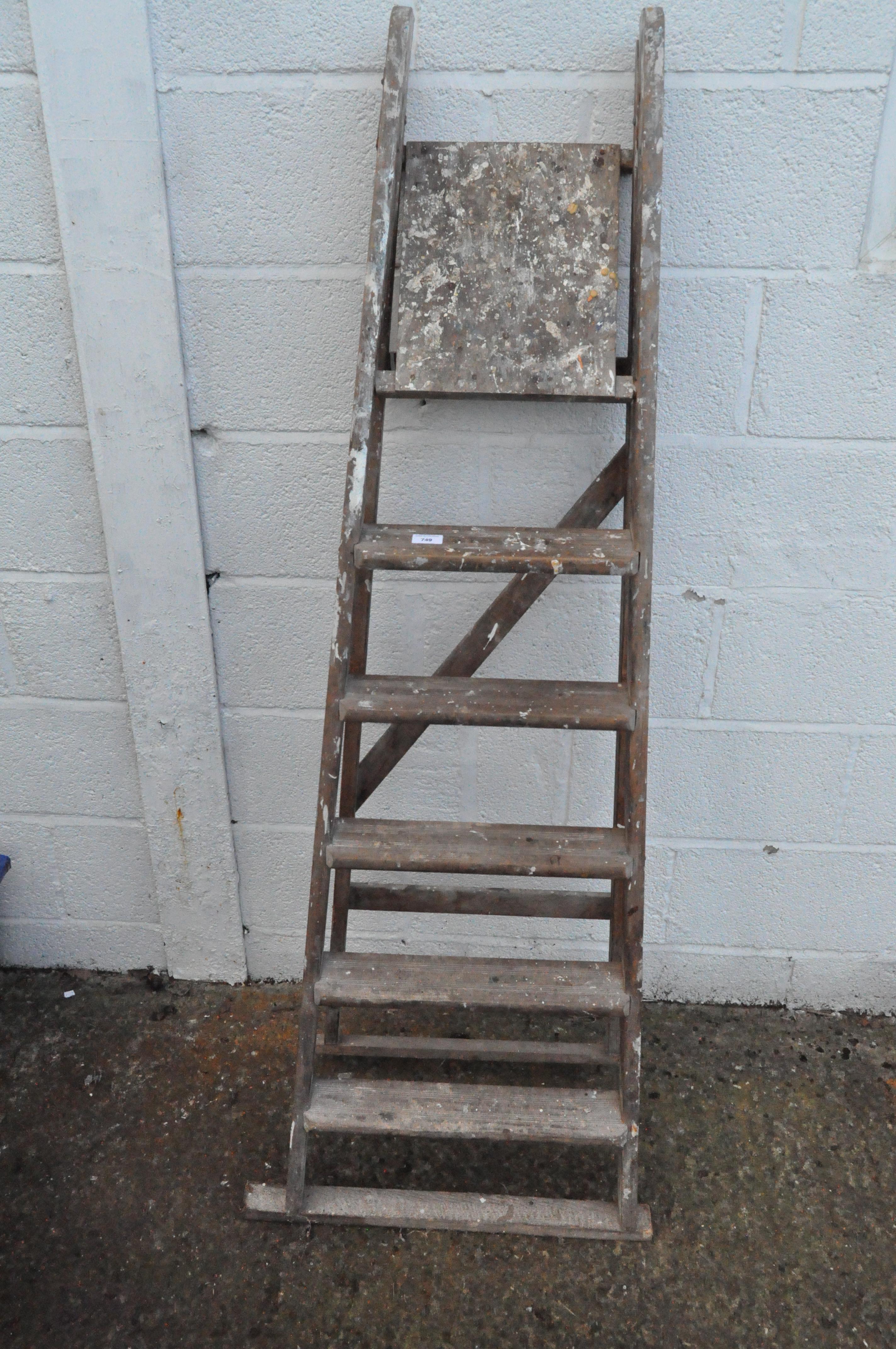 A set of wooden step ladders,