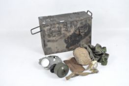 A military gas mask and other military related items,