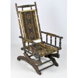 A late 19th/early 20th century turned wooden rocking chair,