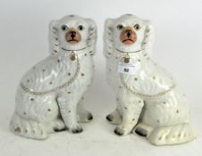 A pair of late 19th century Staffordshire dogs,