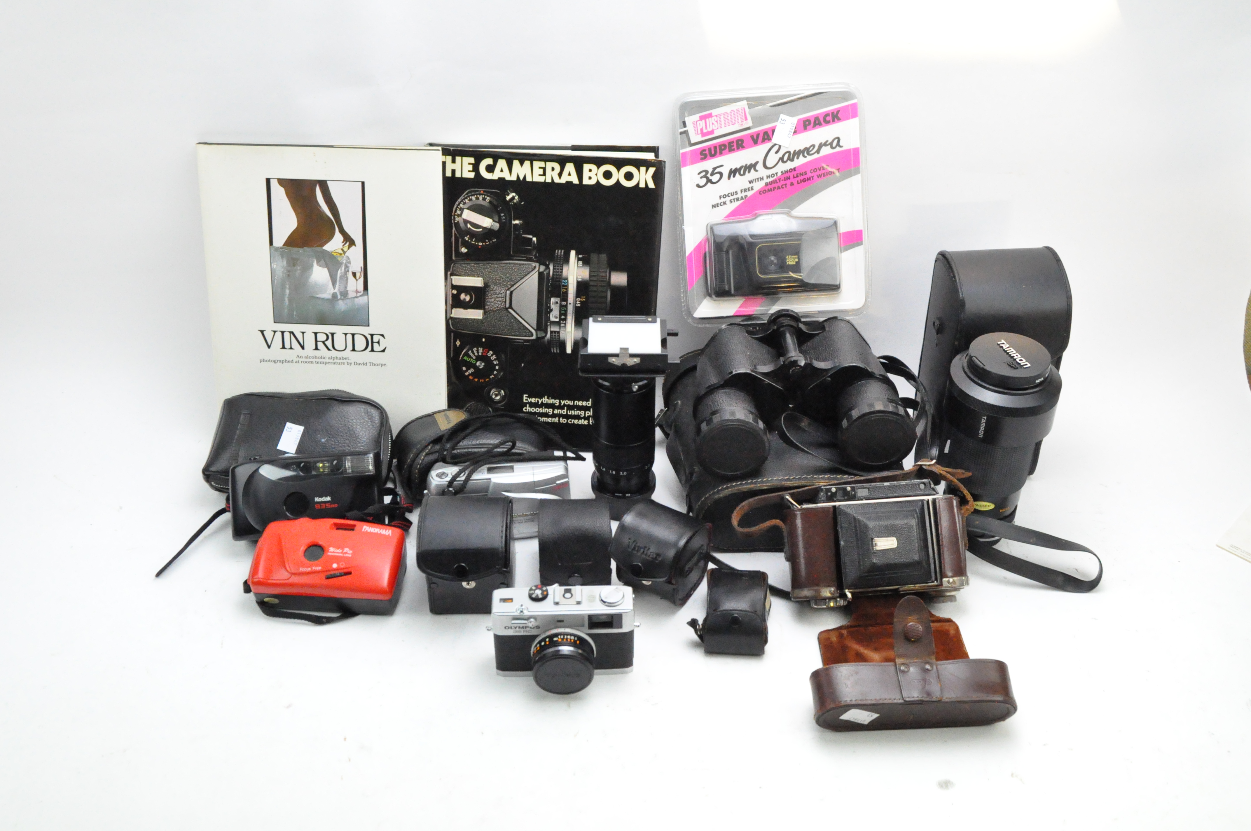 A group of cameras and accessories,