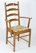 A 20th century wooden carver chair, the structure constructed of turned wooden legs,