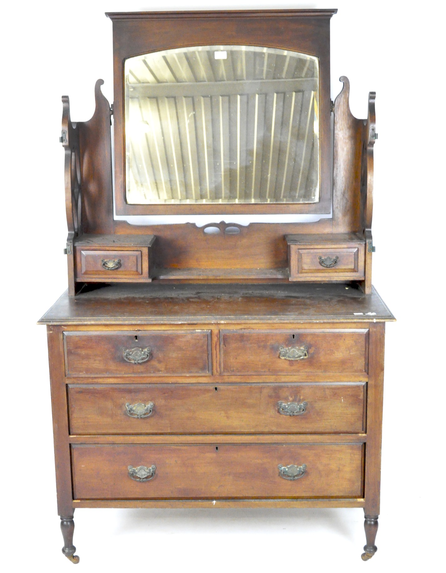 A Victorian mahogany dressing table with large swing mirror,