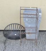 Two metal garden pots, a plant wall pot and a rack