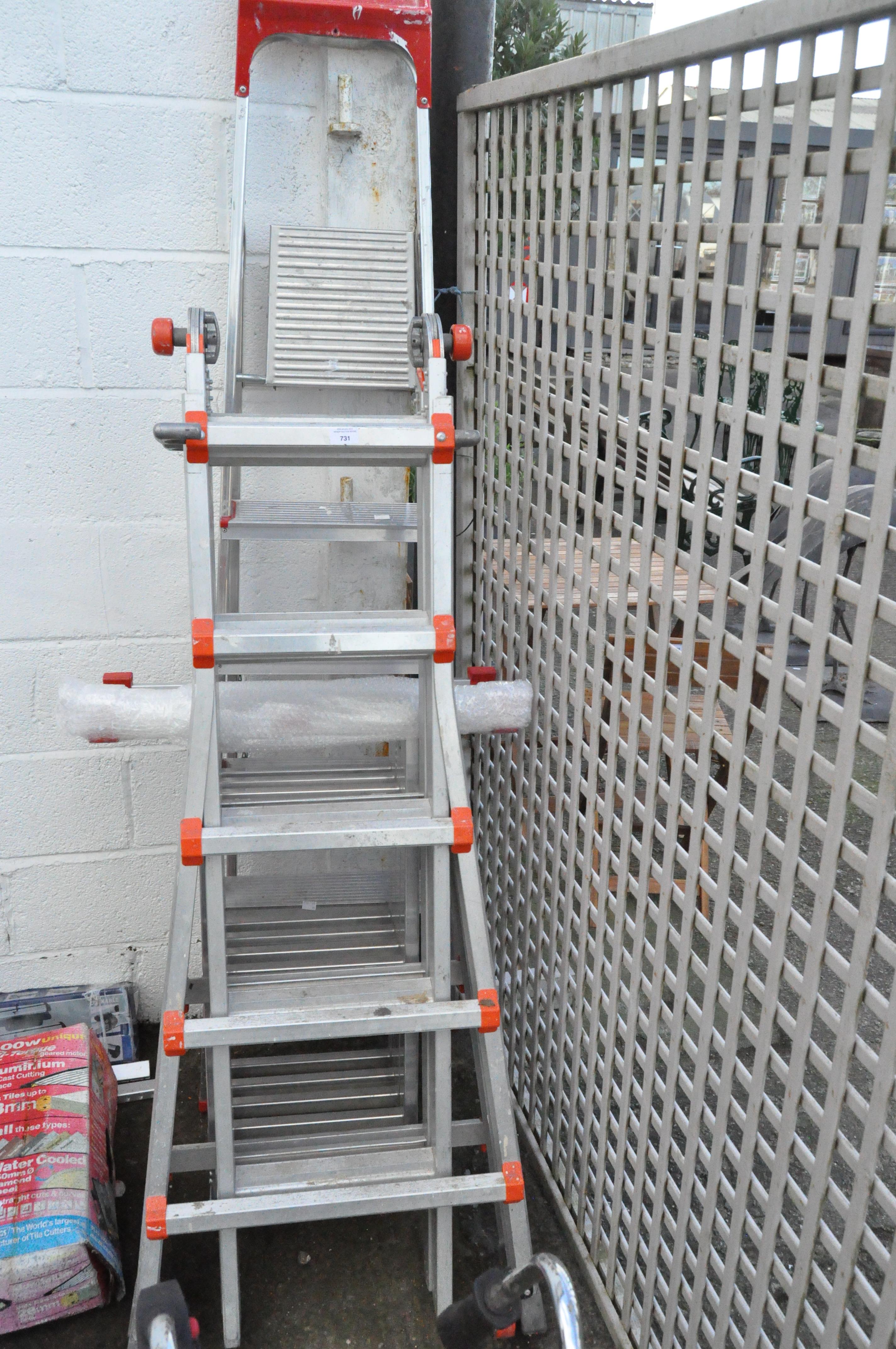 A large pair of aluminium step ladders. 200cm folded plus one unassembled example.