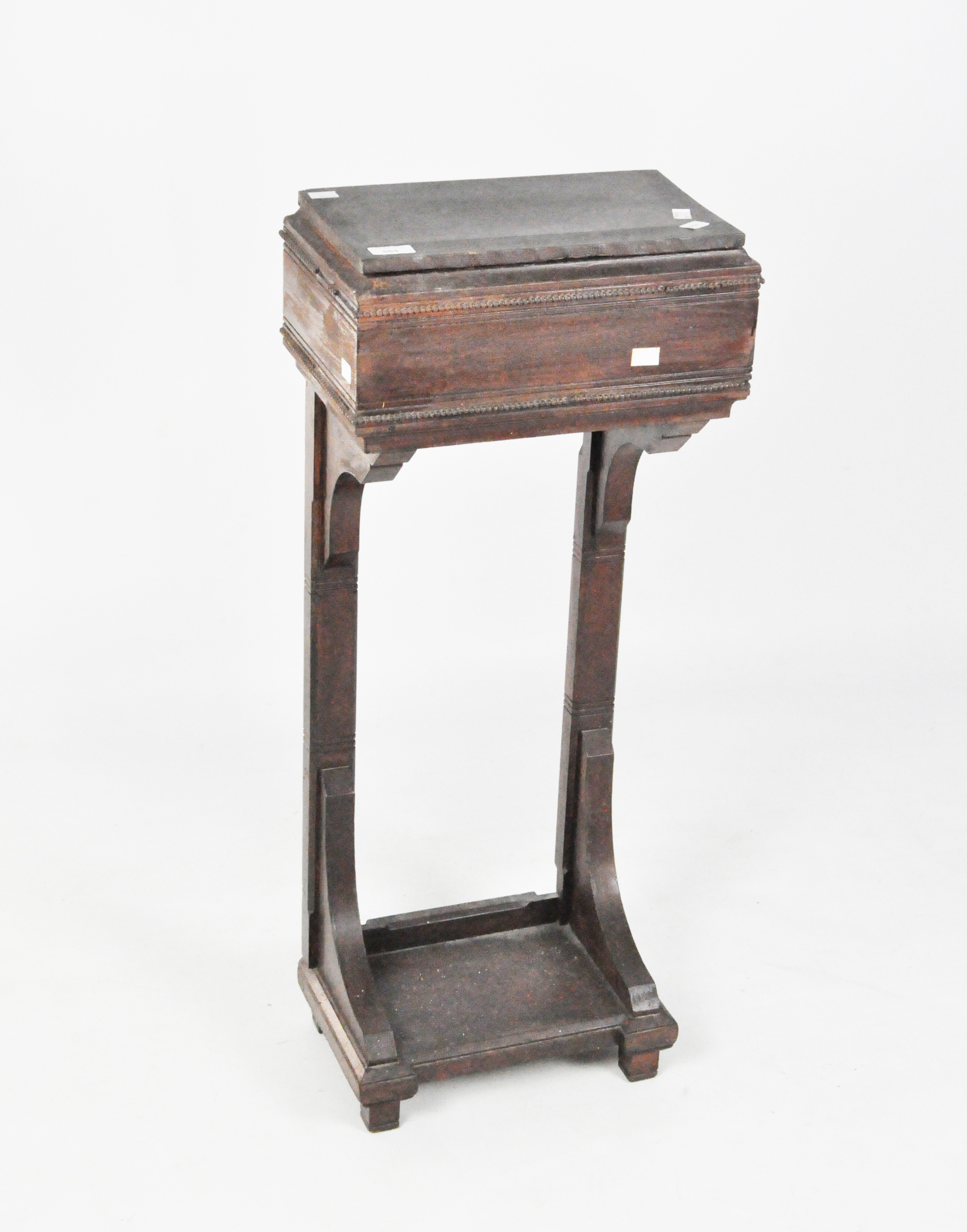 An Edwardian stained wood hallway stand,