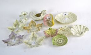 A collection of shell dishes and vases, including several Royal Worcester examples,