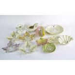 A collection of shell dishes and vases, including several Royal Worcester examples,