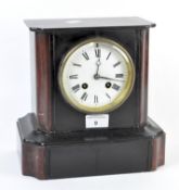 A late 19th century slate and marble inlaid mantle clock,