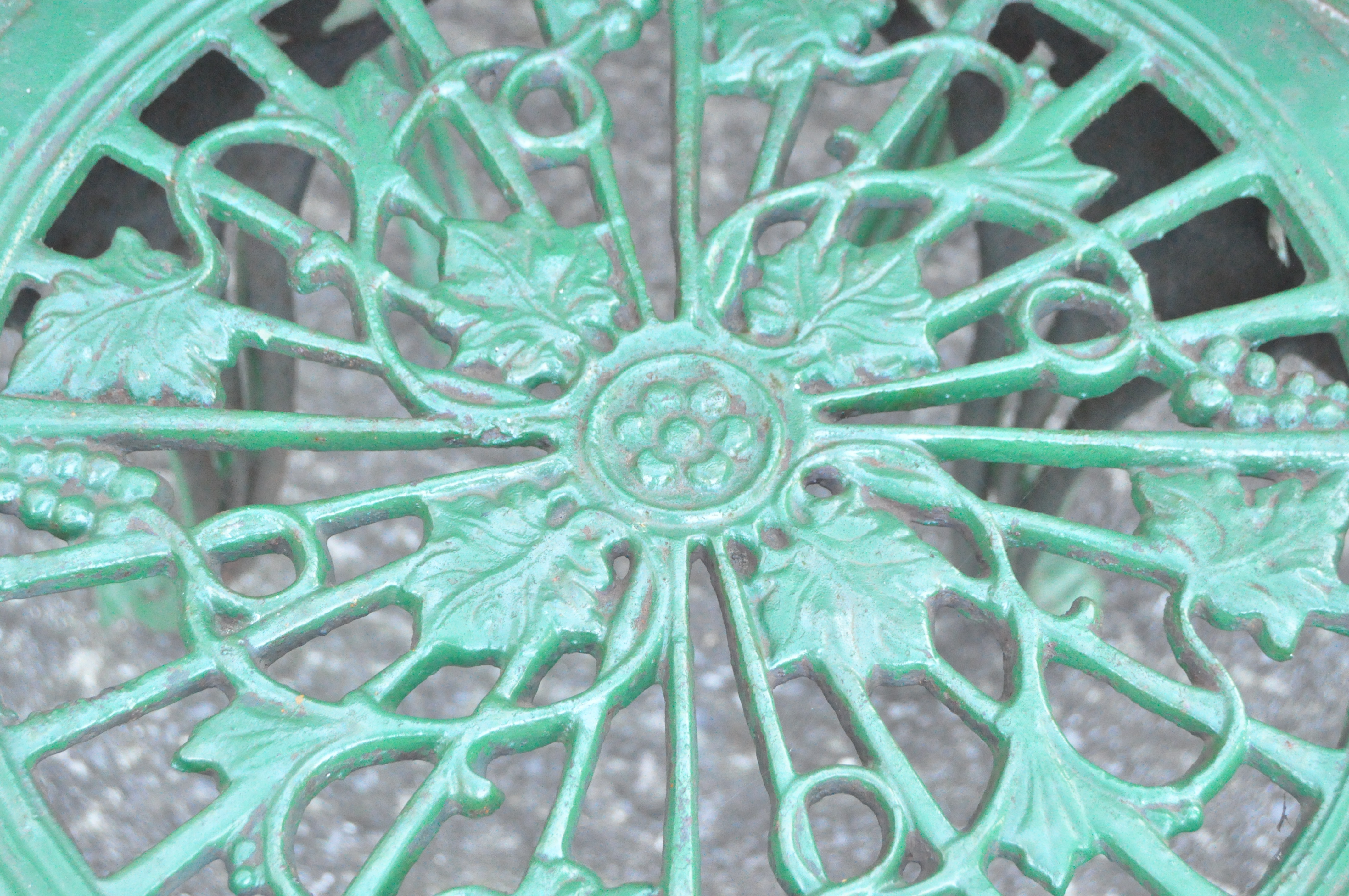 Three green ornate cast iron chairs with pierced grape and vine decoration, - Image 2 of 2