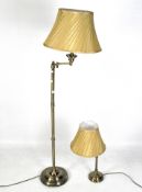 Two modern gilt-metal lamps,