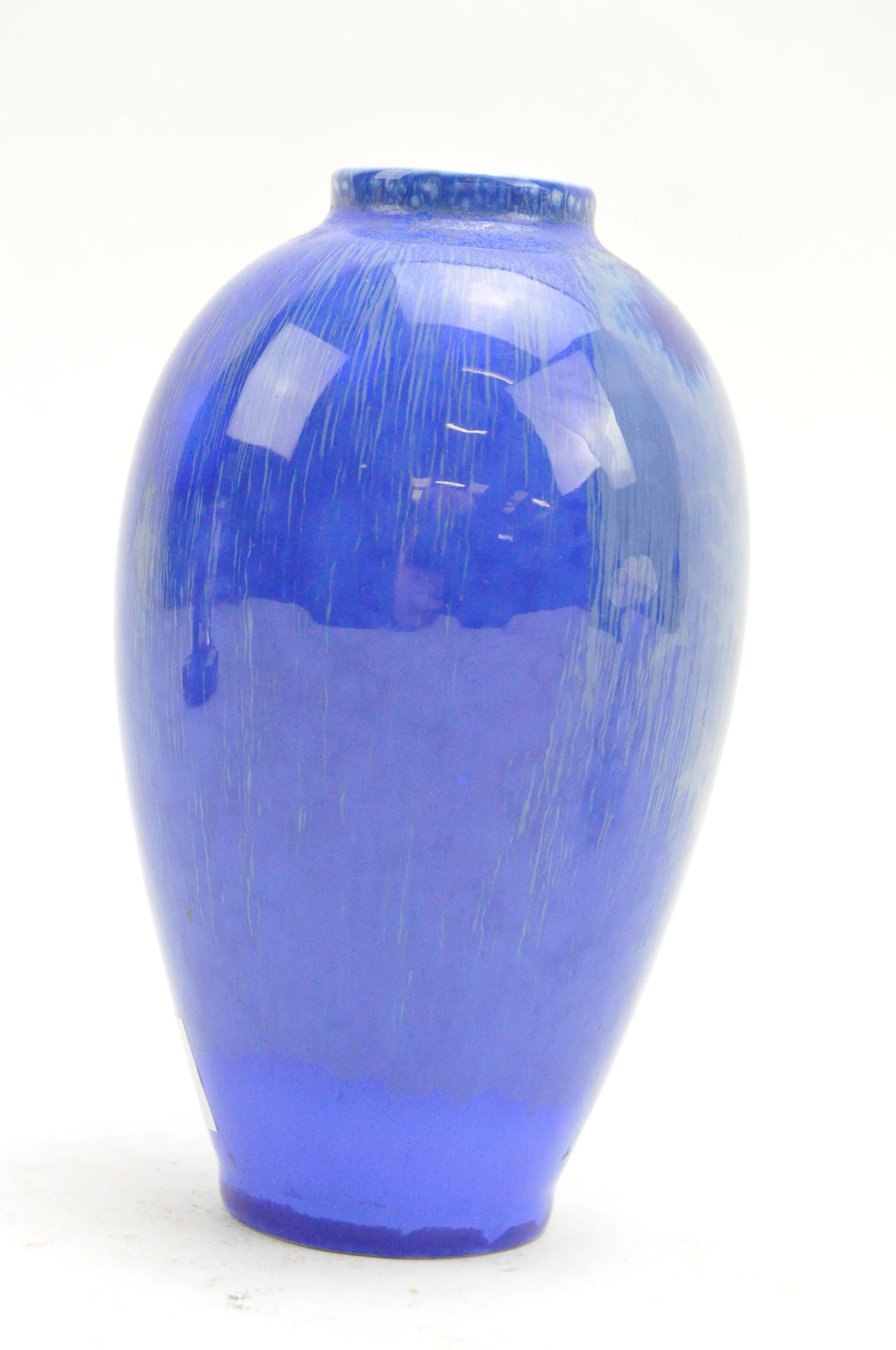 A Royal Copenhagen baluster vase, decorated with a blue glaze to the exterior, height 14.