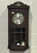 An early 20th century wall clock,