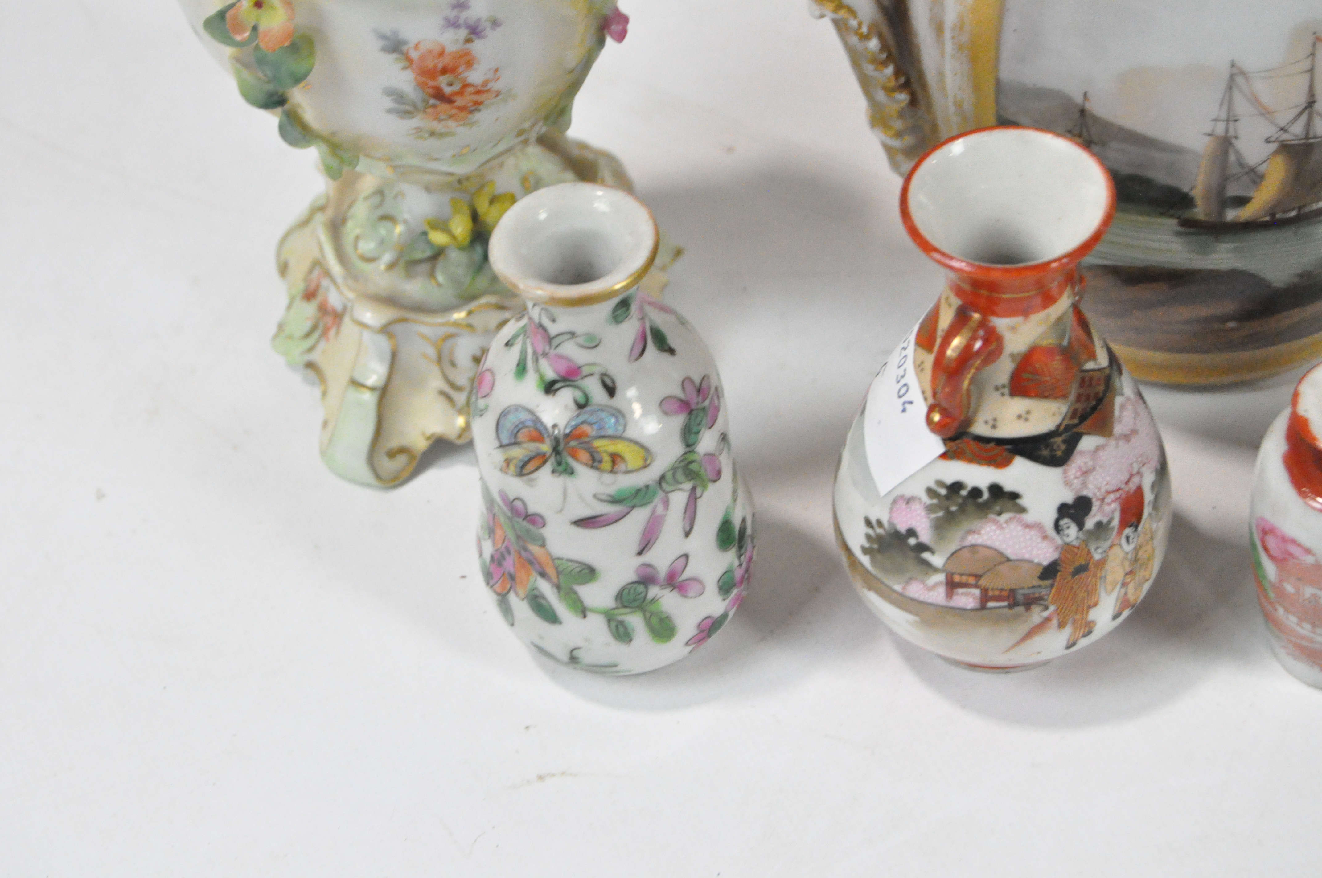 A group of porcelain vases including a gilt two-handled example painted with two landscape scenes, - Image 3 of 3