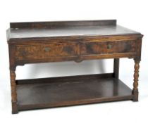 An early 20th century mahogany low sideboard,