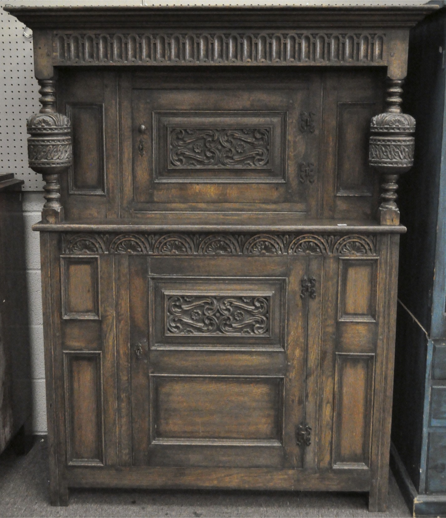 A 19th century carved oak hall or court cupboard,