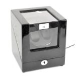 A modern automatic watch winder for two watches,