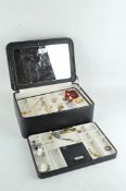 A vintage Dulwich jewellery box containing a small selection of costume jewellery,
