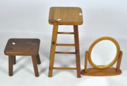 Two wooden stools and toilet mirror,