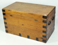 An early 20th century metal bound wooden trunk,