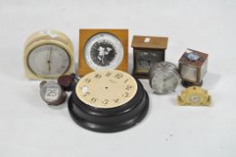 A collection of vintage clocks and barometers, to include a Mappin & Webb mantle clock,