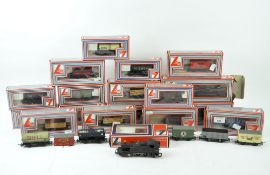 A collection of mostly Lima OO gauge model railway wagons and tenders,