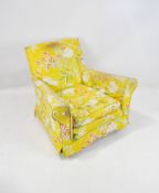 A yellow upholstered armchair, 75cm x 75cm x 83cm.