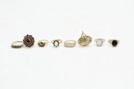 Eight Victorian and later 9ct gold and yellow metal gem set dress rings,