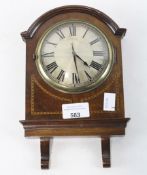 An Edwardian mahogany wall clock, with inlaid stringing detailing,