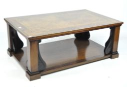 A rectangular parquetry inlaid two tier coffee table,