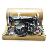 A Harris 9H sewing machine and a sewing table,