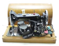 A Harris 9H sewing machine and a sewing table,