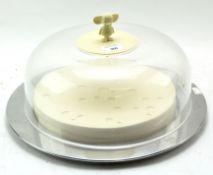 A vintage Alessi cheese dome by Michael Graves,