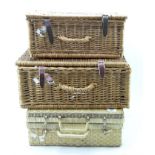 Two Fortnum and Masons wicker hampers and another,