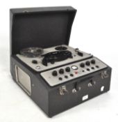 A vintage Brenell Mark 5 M, series 3 reel to reel recorder in a dark grey case,