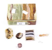 Agate box containing a selection of related jewellery,