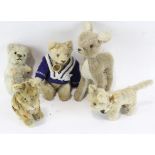 A selection of vintage soft toys,