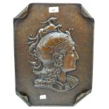 A large copper wall plaque depicting the profile of Minerva,