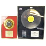 Two presentation vinyl plaques,