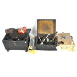 Two wooden boxes containing tools,