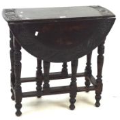 A 19th century style oak drop leaf gateleg table,