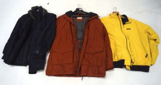 Three mens waterproof coats, including an orange 'Selected Homme Jeans' jacket no.