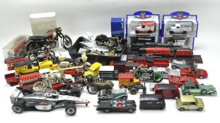 A collection of diecast model vehicles,