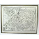 A reproduction map of Somerset, depicting a John Speed example, framed and glazed,