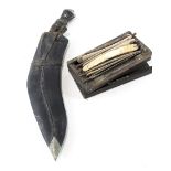 A 20th century Kukri knife and a selection of vintage cut throat razors,