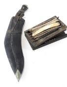A 20th century Kukri knife and a selection of vintage cut throat razors,