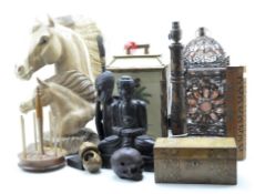 A collection of treen, including a lampbase carved with ivy, a sculpture of a horse,