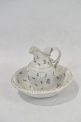 A 19th century porcelain wash bowl and basin,